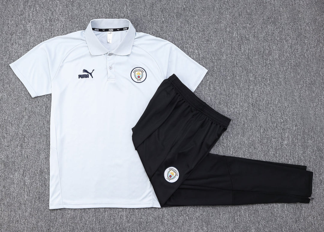 NEW MANCHESTER CITY 1º TRACKSUIT POLO 23/24